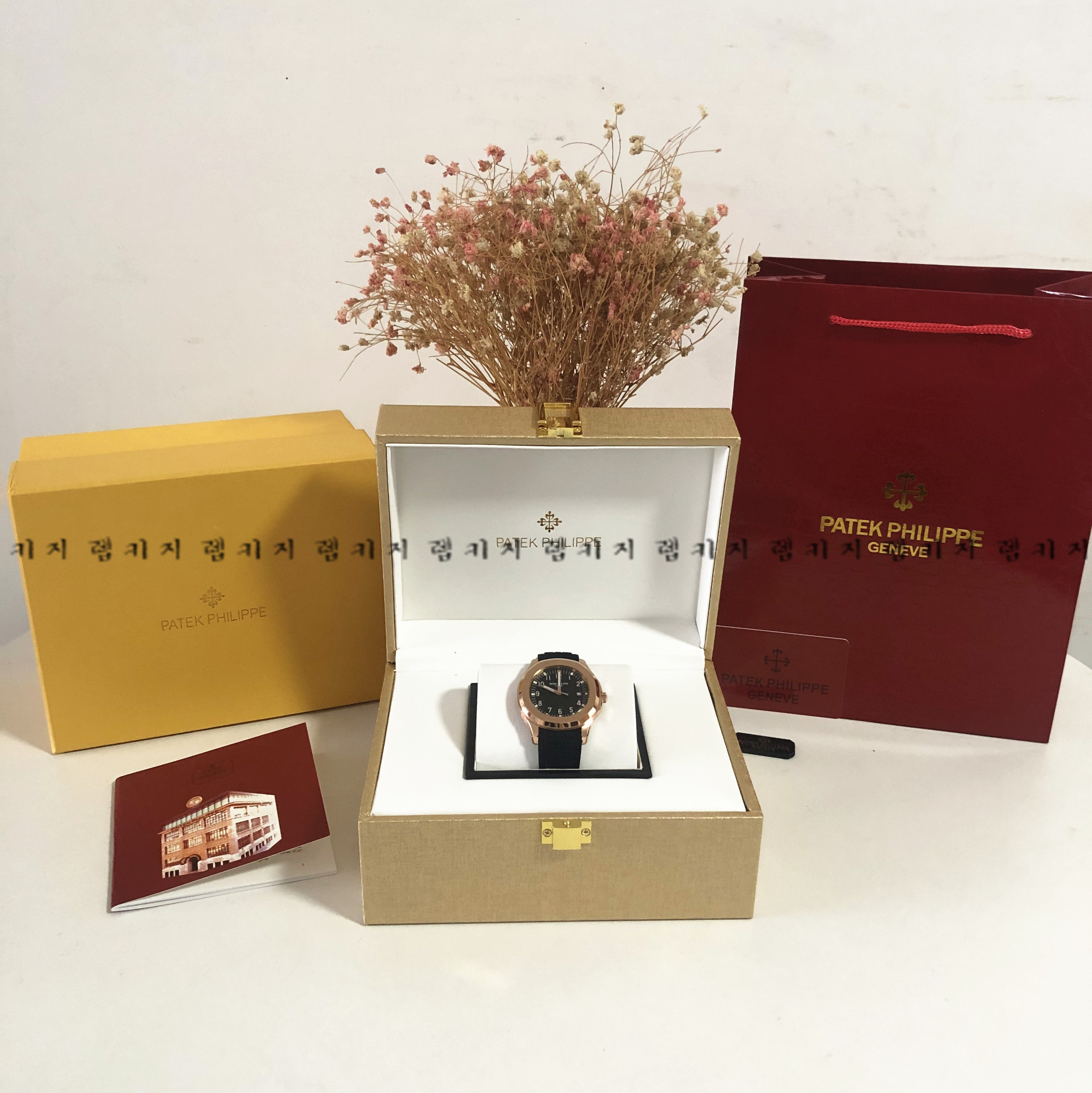 파텍필립 아쿠아넛 골드베젤 블랙 우레탄 러버밴드